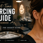 First-Time Piercing Guide in Denver feature image for The Hidden Hand Tattoo showing professional ear and nose piercing, clean studio setup, and business logo.